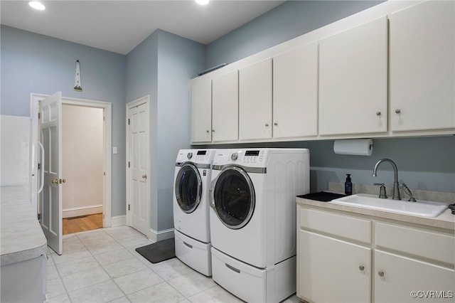 16460 W Crescent Ln, Hanover, VA 23192 - laundry area with washing machine and clothes dryer, cabinet space, light tile patterned floors, recessed lighting, and baseboards