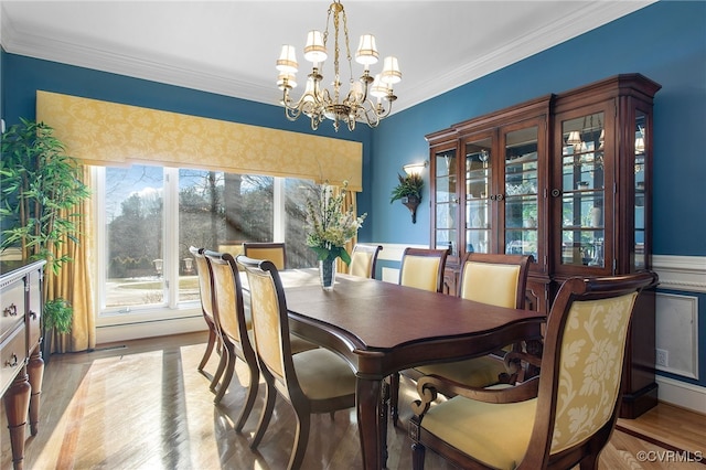 16460 W Crescent Ln, Hanover, VA 23192 - dining room featuring a chandelier, crown molding, and wood finished floors