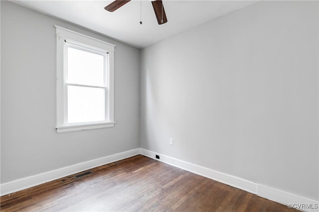 unfurnished room featuring ceiling fan and hardwood / wood-style flooring