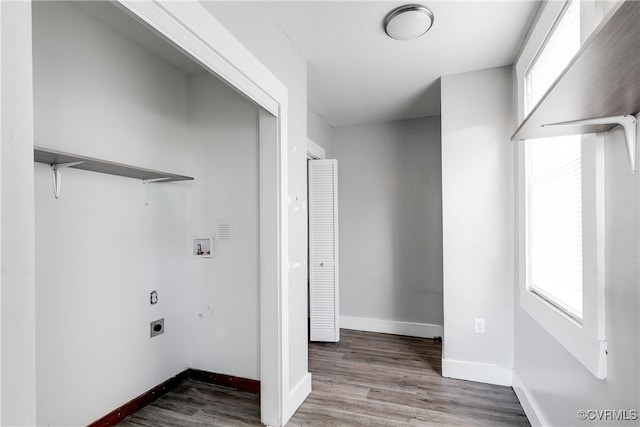 laundry area with hookup for an electric dryer, washer hookup, and hardwood / wood-style floors