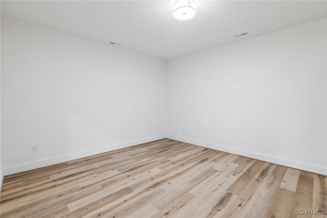 empty room featuring light hardwood / wood-style floors