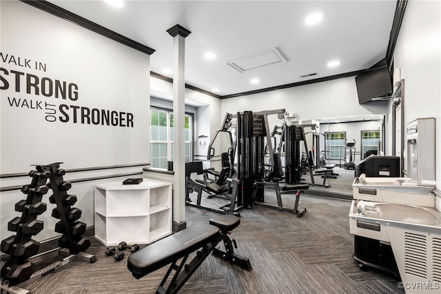 workout area featuring crown molding and dark carpet