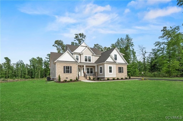 craftsman-style house featuring central air condition unit and a front yard