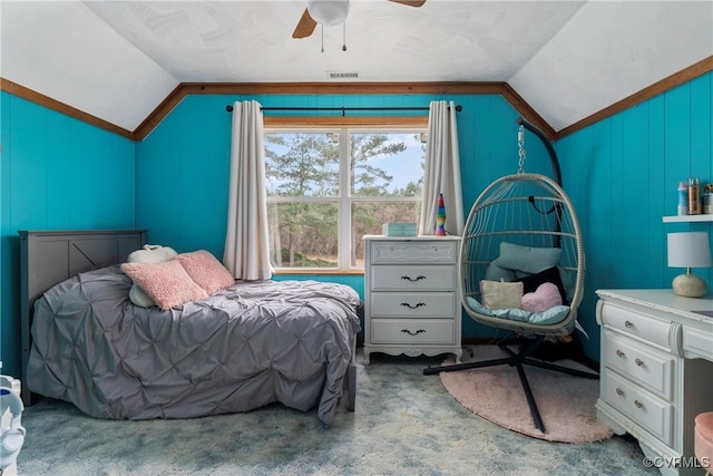 carpeted bedroom with ceiling fan and lofted ceiling