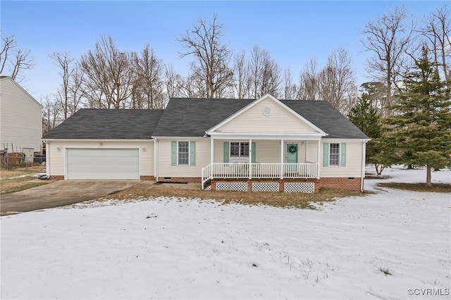 view of front of property with covered porch and a garage