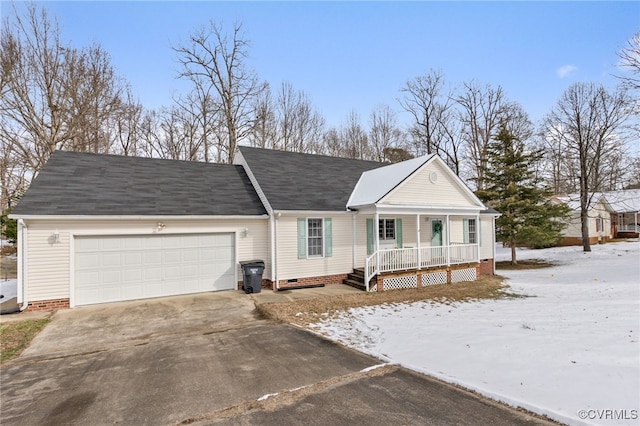 single story home with a porch and a garage