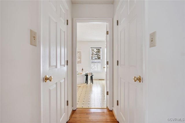 hallway featuring light hardwood / wood-style floors