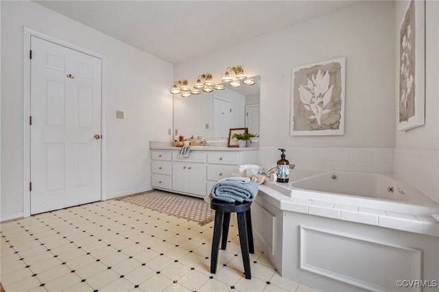 bathroom with a bathing tub and vanity