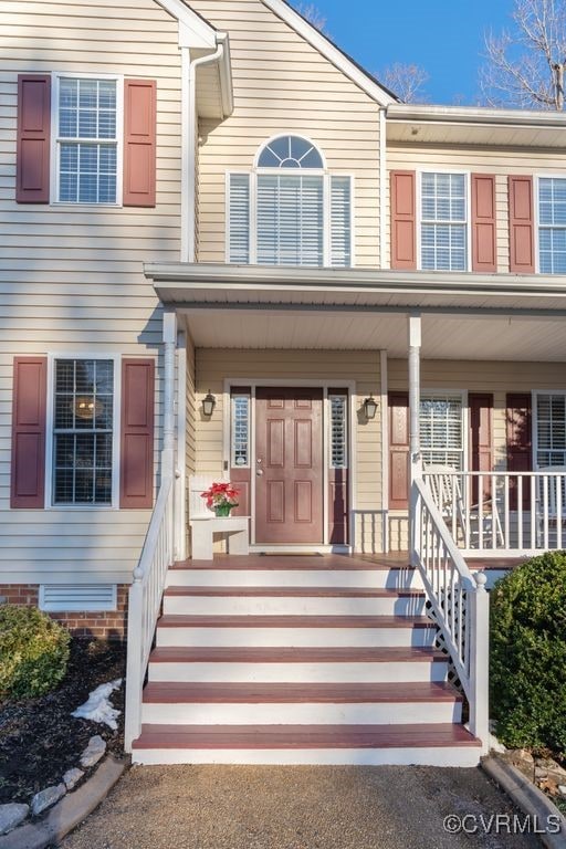 entrance to property with a porch