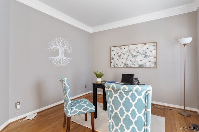 office area featuring crown molding and hardwood / wood-style floors