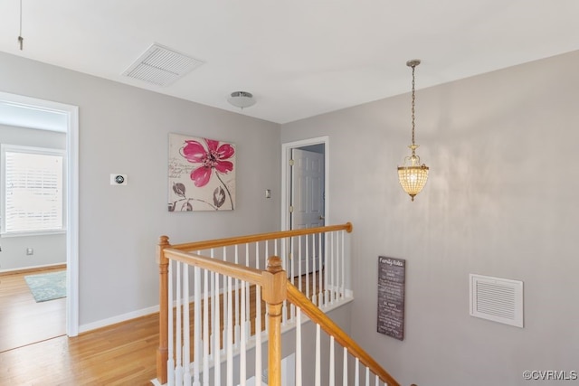 corridor featuring hardwood / wood-style flooring