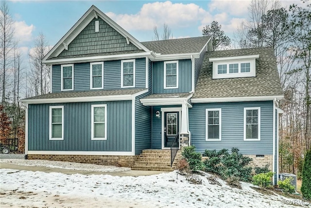 craftsman-style house with central AC unit