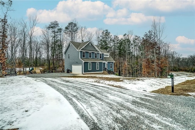 view of front of home with a garage