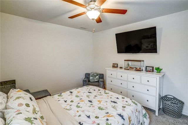 bedroom featuring light colored carpet and ceiling fan