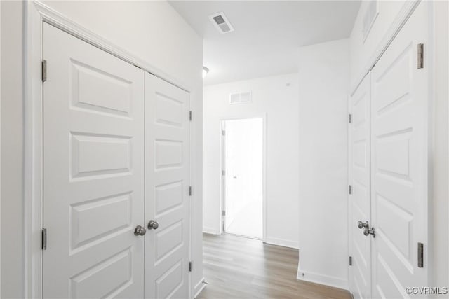 hall featuring light hardwood / wood-style flooring