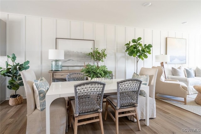 dining room with light hardwood / wood-style floors