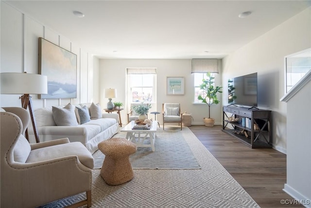 living room with dark wood-type flooring