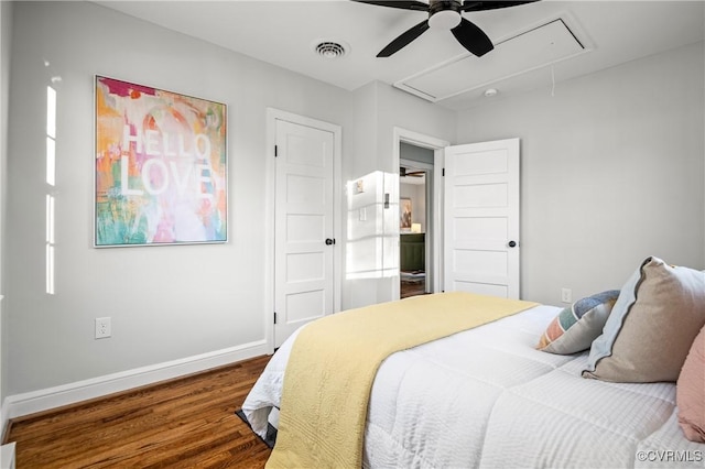 bedroom with ceiling fan and dark hardwood / wood-style floors