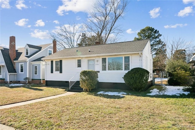 view of front of home with a front lawn