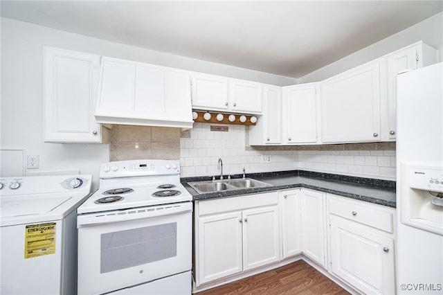 kitchen with sink, white cabinetry, tasteful backsplash, white appliances, and washer / clothes dryer