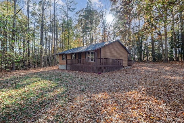 exterior space featuring a wooden deck