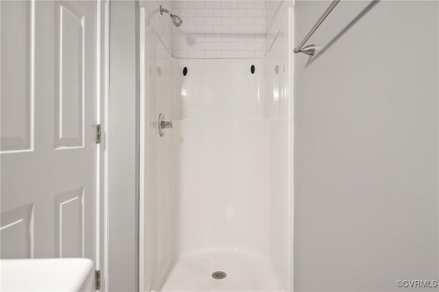 bathroom with walk in shower