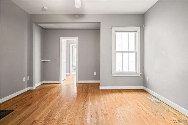 unfurnished room featuring light wood-type flooring