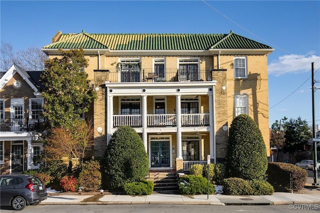 view of property featuring a balcony