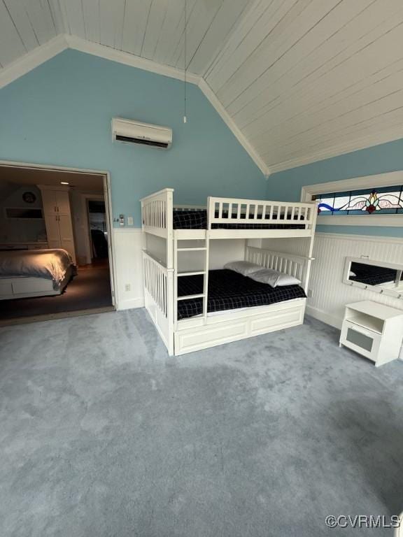 unfurnished bedroom featuring lofted ceiling, wooden ceiling, a wall mounted air conditioner, carpet, and crown molding