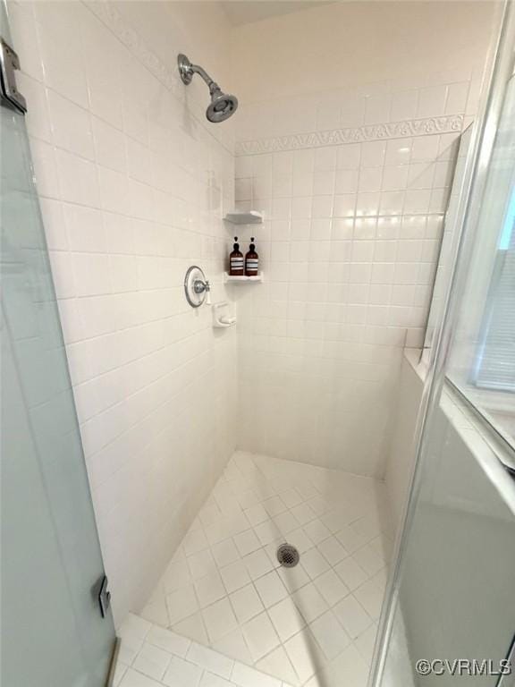 bathroom with a stall shower