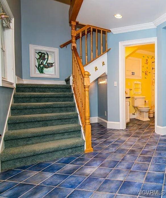 stairway featuring ornamental molding, recessed lighting, and baseboards