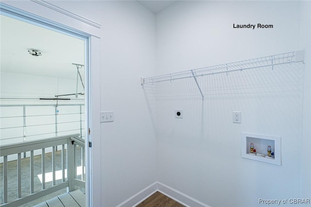 laundry area with hookup for an electric dryer, wood-type flooring, and washer hookup