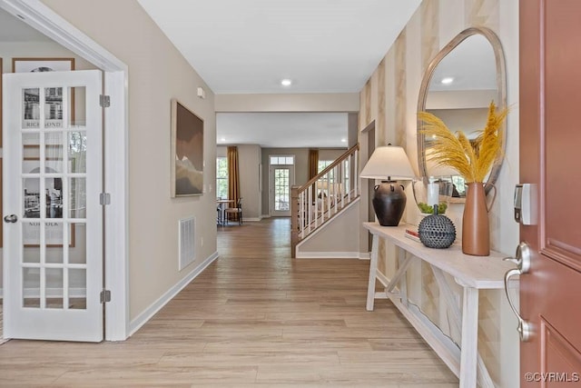 hallway featuring light hardwood / wood-style flooring