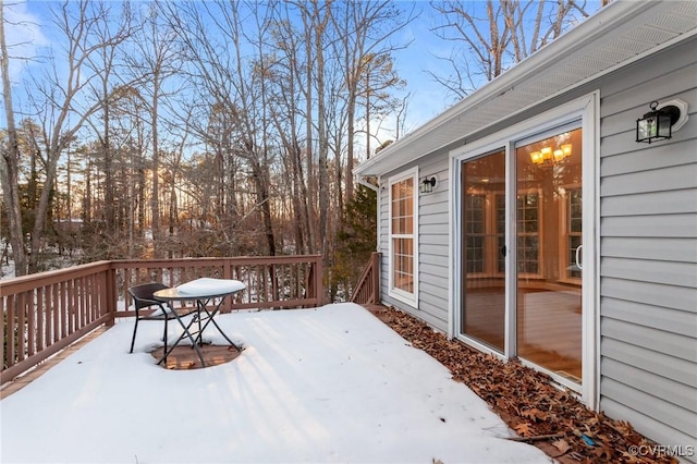 view of snow covered deck