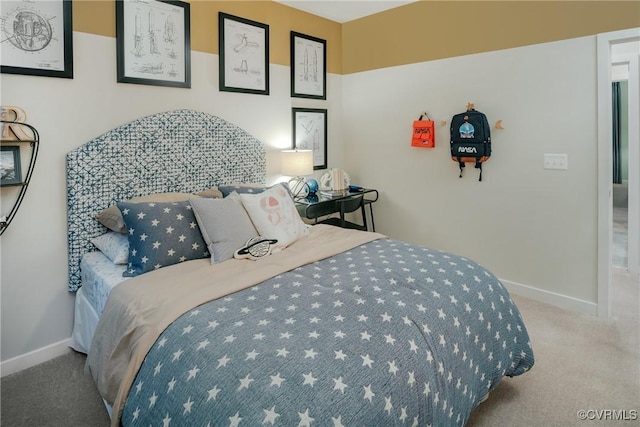 bedroom featuring light carpet