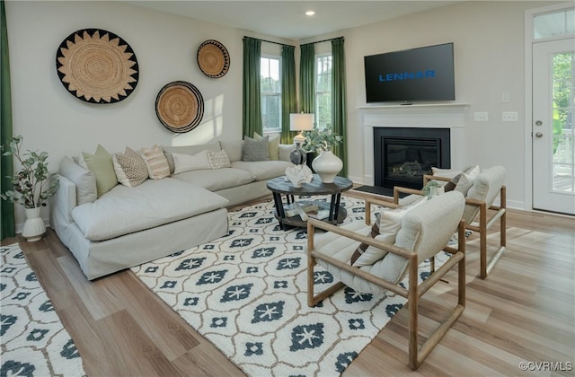 living room with light hardwood / wood-style floors