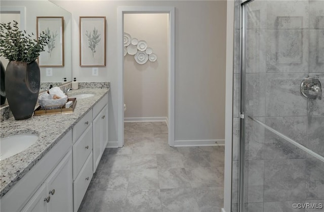 bathroom featuring toilet, a shower with door, and vanity