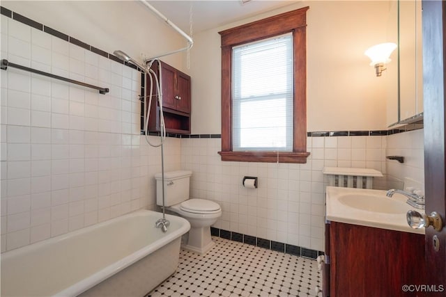 full bathroom featuring tile walls, a wealth of natural light, vanity, and toilet