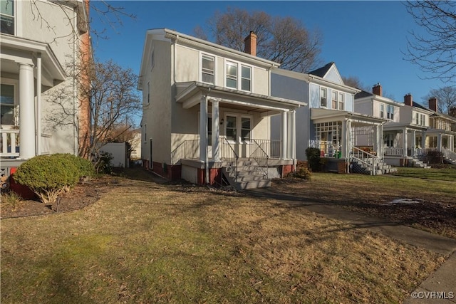 view of front of house with a front lawn