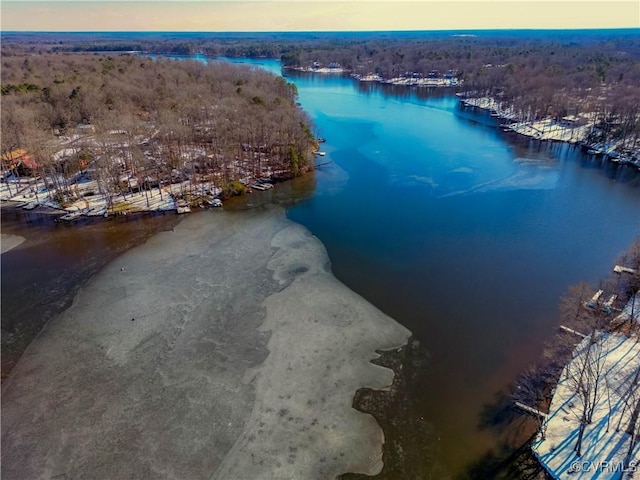 aerial view at dusk with a water view