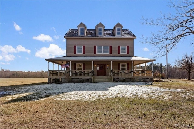 view of front facade with covered porch and a front lawn