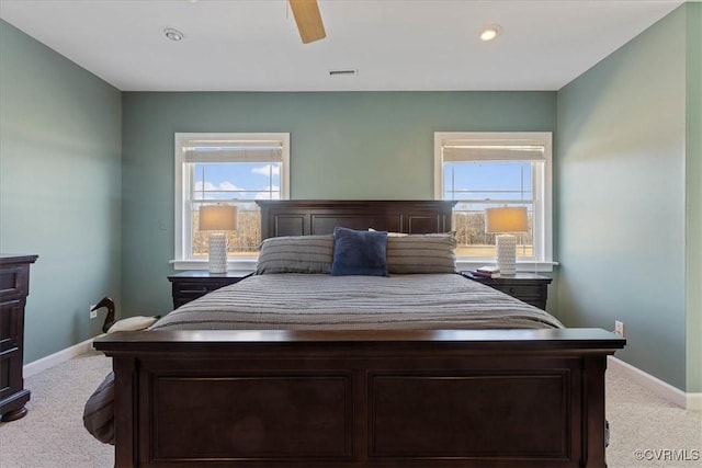 carpeted bedroom with ceiling fan