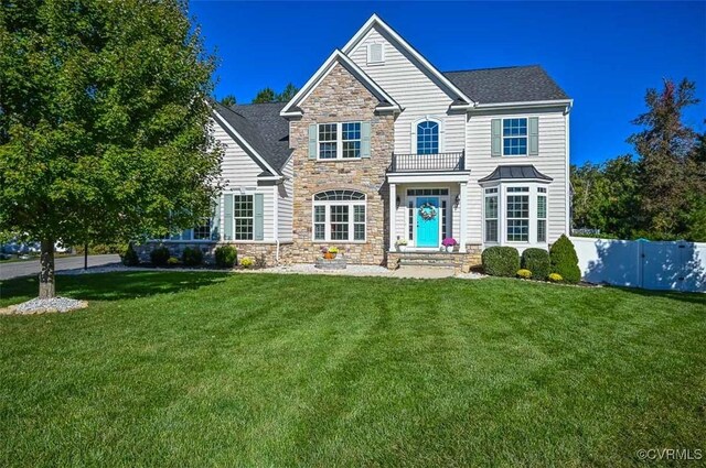 view of front of home with a front yard