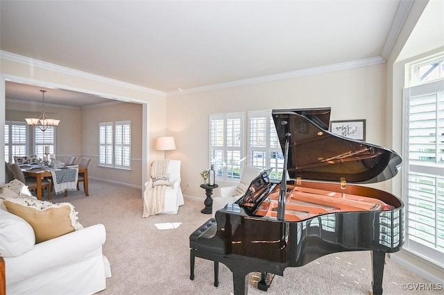 interior space with crown molding, light colored carpet, and an inviting chandelier