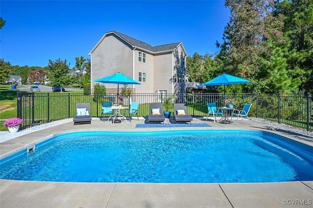 view of swimming pool featuring a patio