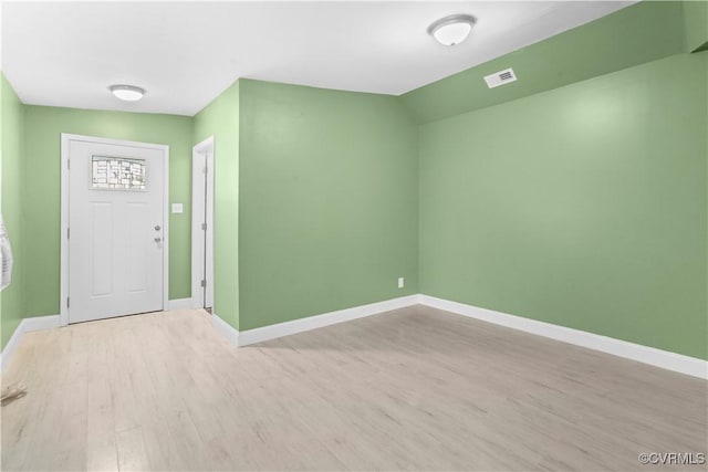 entrance foyer featuring light hardwood / wood-style floors