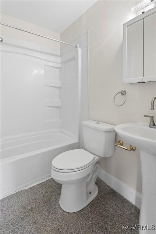 full bathroom with sink, bathing tub / shower combination, and toilet