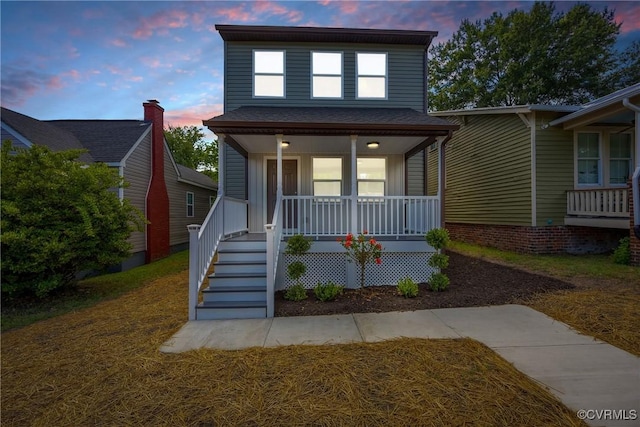 view of front of home featuring covered porch