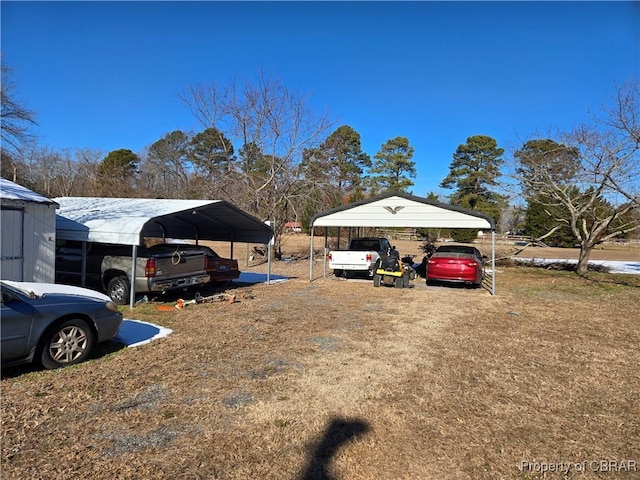 view of yard with a carport