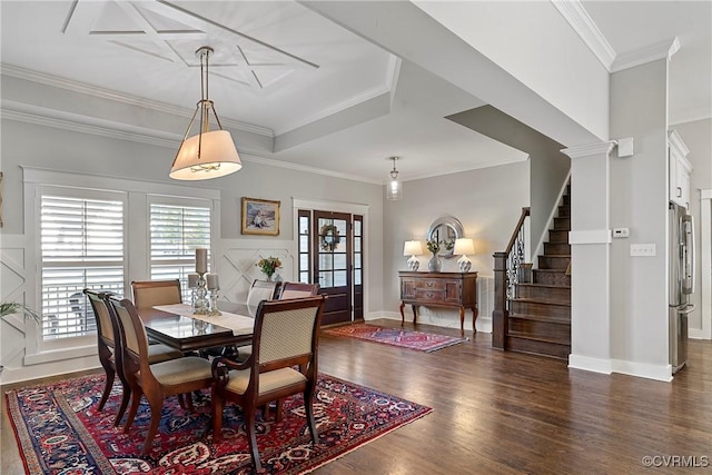 dining room featuring crown molding and dark wood-type flooring